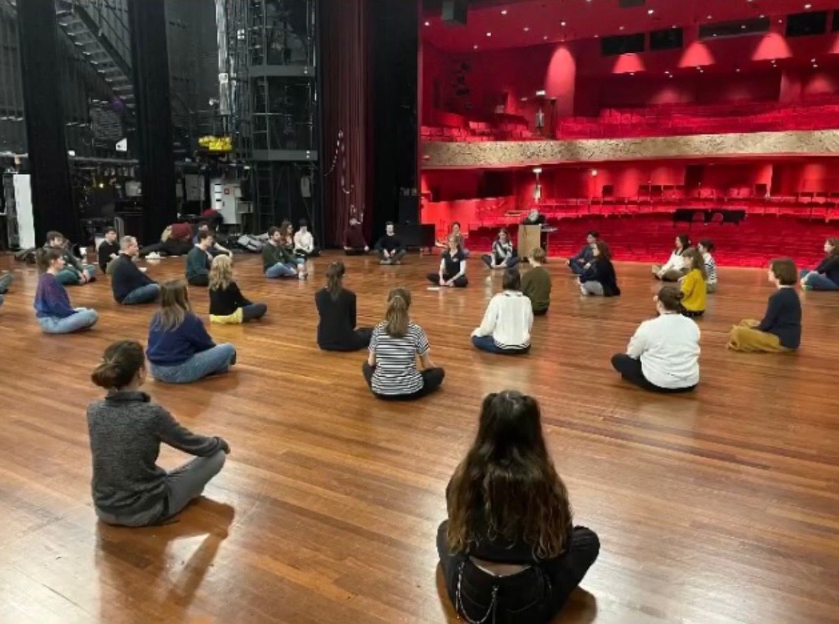 Meditation circle on stage